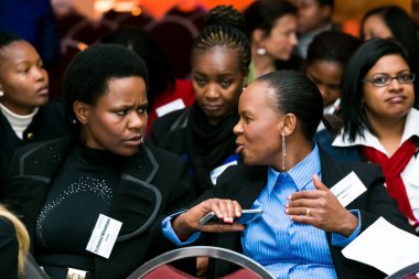 Johannesburg, South Africa - July 14, 2014: Diverse woman networking at corporate convention event