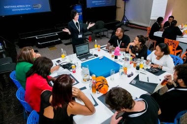 Johannesburg, South Africa - February 24, 2014: Diverse College students attending a business leadership workshop