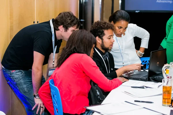 Johannesburg, South Africa - February 24, 2014: Diverse College students attending a business leadership workshop