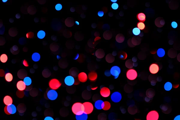 Sparkling blue and red greeting fireworks — Stock Photo, Image