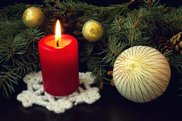 Red candle and white christmas ball — Stock Photo, Image
