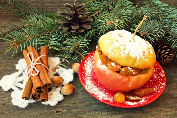 Apple filled with nuts, raisins and honey. christmas snack — Stock Photo, Image