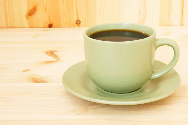 Café sobre fondo de madera — Foto de Stock