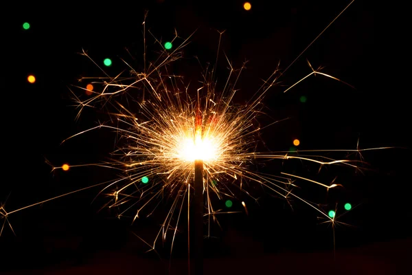 Burning festive sparkler — Stock Photo, Image
