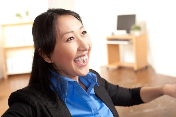 Energetic Asian professional woman — Stock Photo, Image