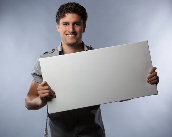 Handsome man in studio. — Stock Photo, Image