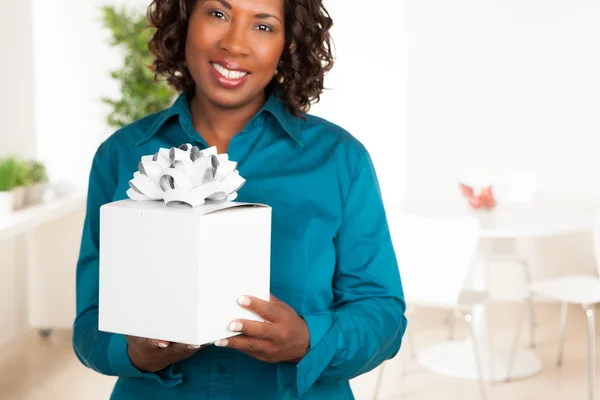 Attractive black woman with blue shirt. — Stock Photo, Image