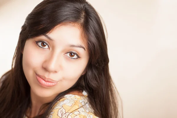 Cute Hispanic lady in living room — Stock Photo, Image