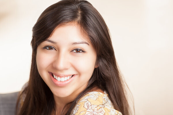 Cute Hispanic lady in living room