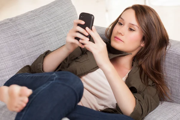 Attractive white woman relaxing at home — Stock Photo, Image