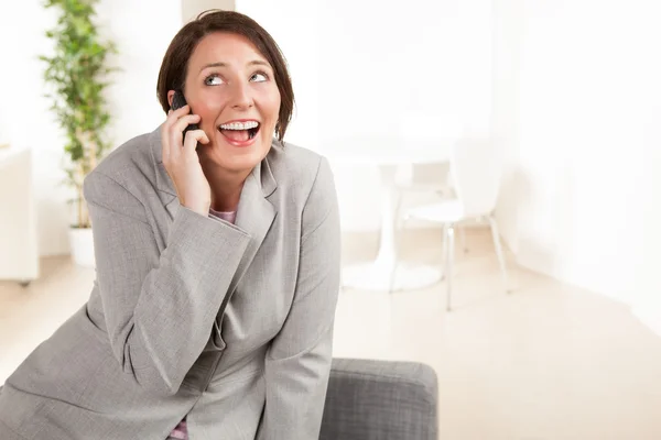 Beautiful white woman at work — Stock Photo, Image