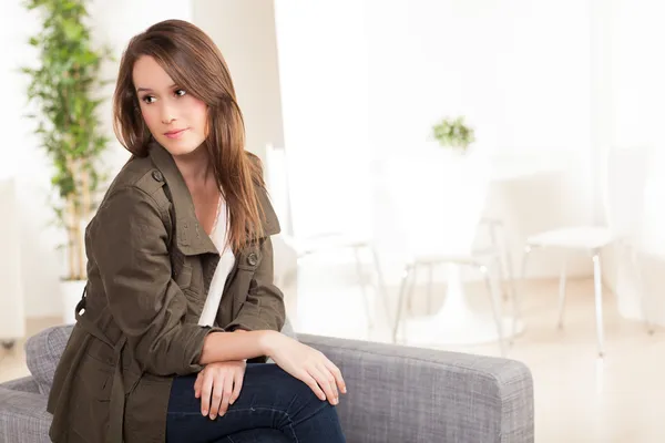 Attractive white woman relaxing at home Stock Picture