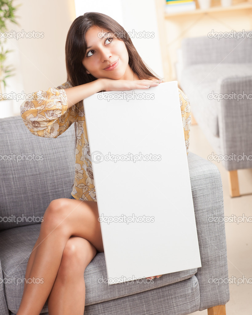 Cute Hispanic lady holding blank sign