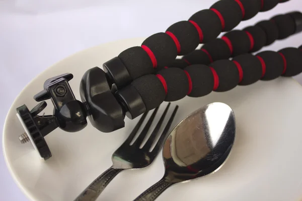 Camera Tripod on plate — Stock Photo, Image