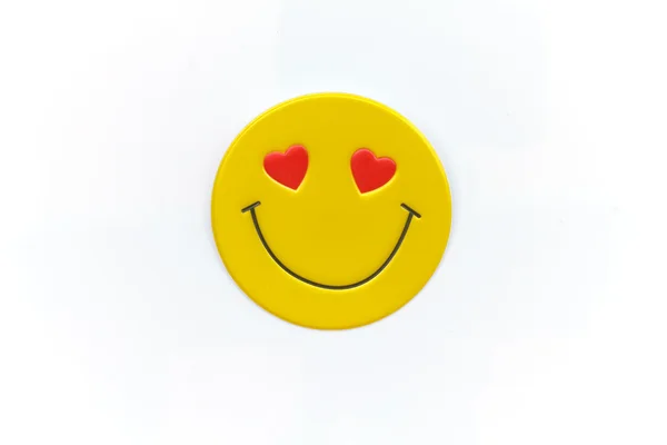 Lichte, gele sticker met een smiley — Stockfoto