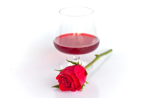 Red rose with wine glass — Stock Photo, Image