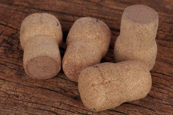Champagne corks  on a wooden background ground — Stock Photo, Image