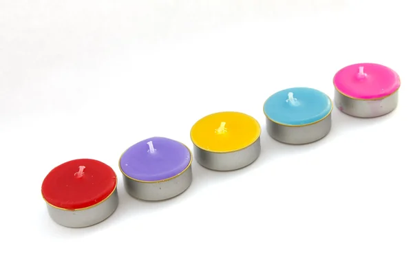 Colorful short candles without flame. Isolated over white backgr — Stock Photo, Image