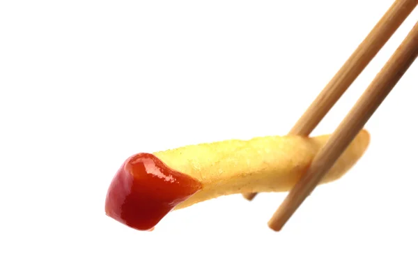 Close up image of dipping fried potato on white background — Stock Photo, Image