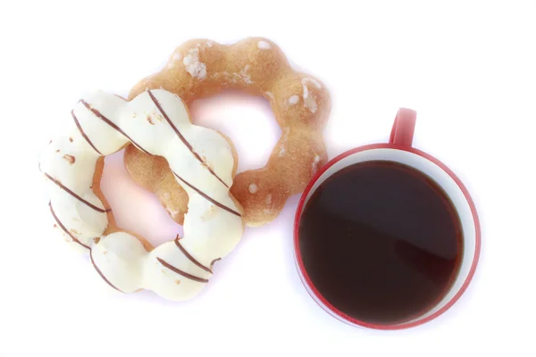 Ciambelle e caffè su sfondo bianco — Foto Stock