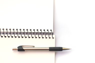 Not defteri ve kalem.