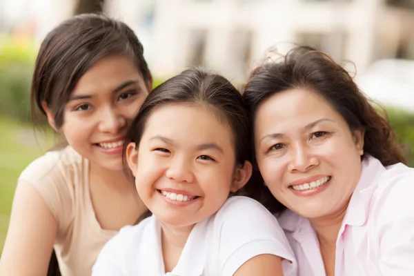 Granddaughters and grandmother — Stock Photo, Image