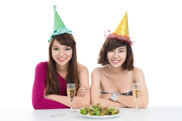 Girls at festive table — Stock Photo, Image