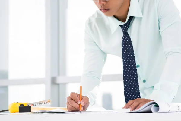 Concentrated on blueprint — Stock Photo, Image