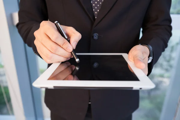 Holding stylus pen — Stock Photo, Image