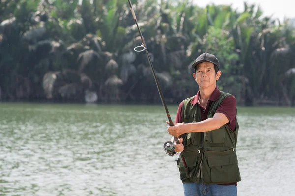 Senior fisherman — Stock Photo, Image