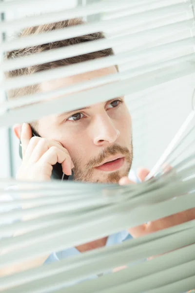 Businessman talking by phone — Stock Photo, Image