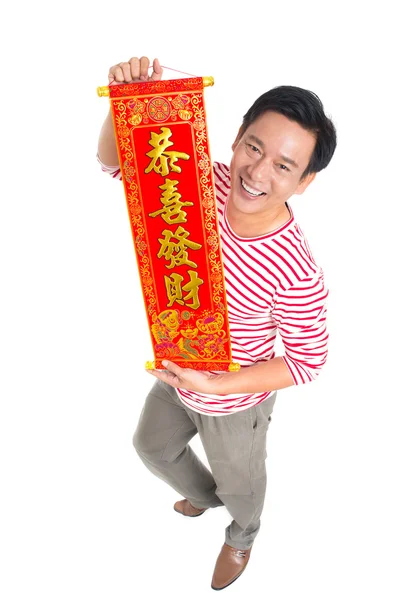 Man holding Tet textile — Stock Photo, Image