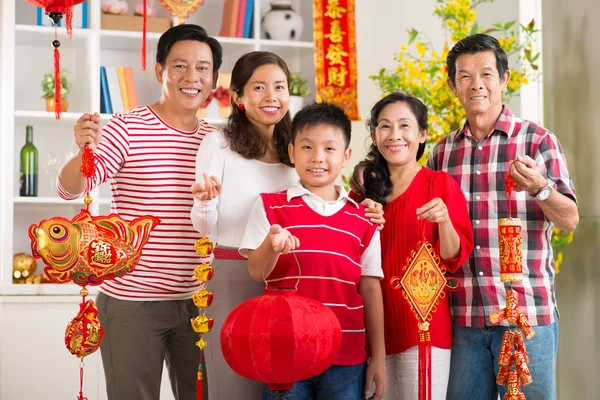 Family showing Tet symbols — Stock Photo, Image
