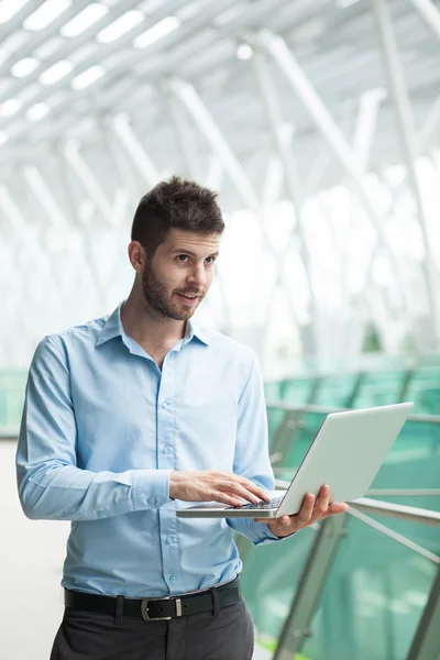 Businessman networking with computer — Stock Photo, Image