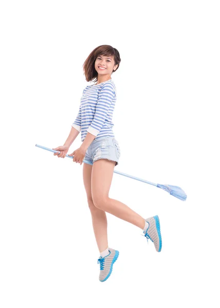 Riding a broom — Stock Photo, Image