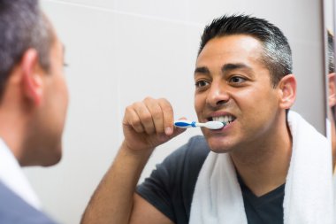 Man brushing teeth clipart