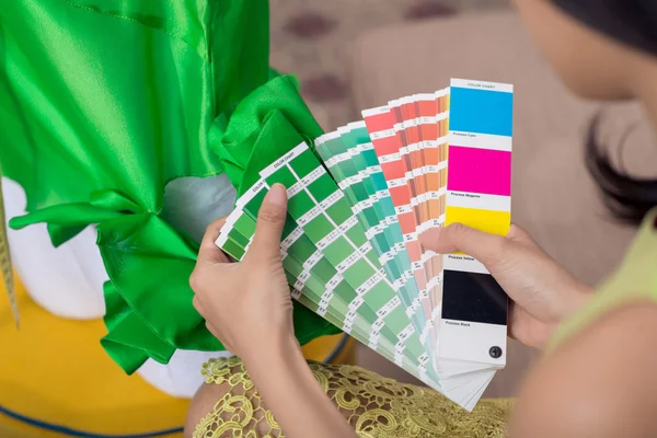 Designer choosing proper color — Stock Photo, Image