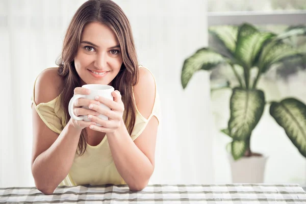 Woman with tea — Stock Photo, Image