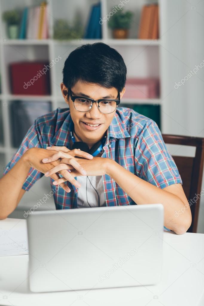 Vietnamese student with laptop Stock Photo by ©DragonImages 48699635