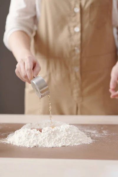 Person Adding Lye Water to Flour — Stock Photo, Image