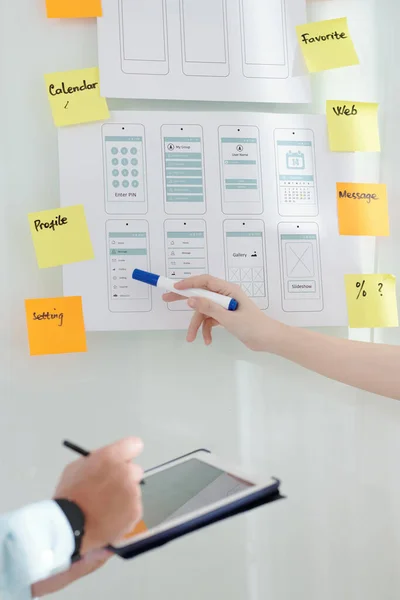 Business People Discussing Interface Mockups — Stock fotografie