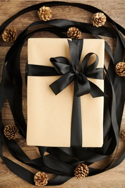 Present Decorated with Black Bow — Stockfoto