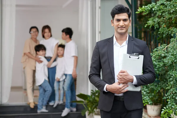 Insurance Agent with Clipboard — Stock Photo, Image