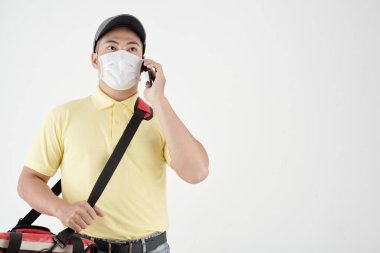 Courier Talking on Phone