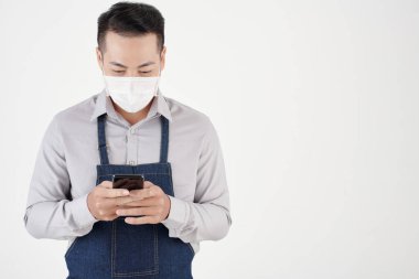 Coffeshop Waiter Checking Messages