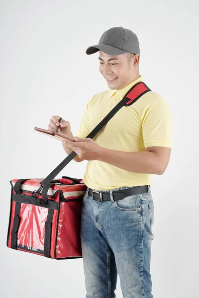 Deliveryman Filling Form on Tablet — Fotografia de Stock