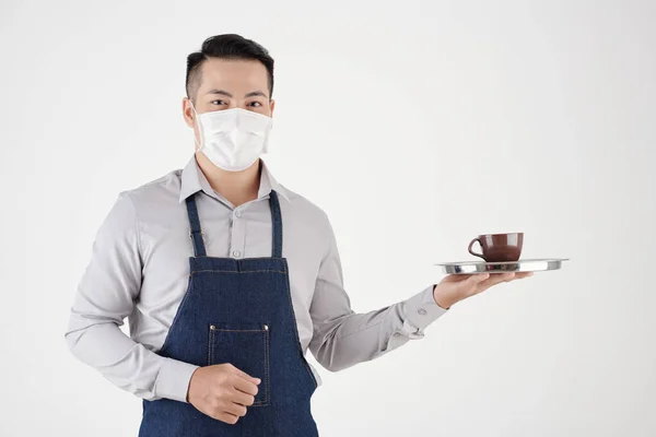 Restaurant Waiter Holding Cup of Cappuccino — Fotografia de Stock