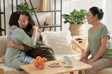 Happy Senior Women Hugging