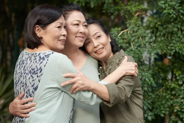 Hugging Smiling Senior Women — Stok fotoğraf