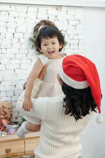 Woman Lifting Little Daughter — Fotografia de Stock